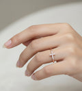 Cross adjustable ring